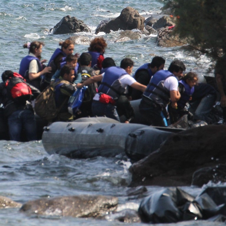 Photo of Syrian Refugees on inflatable boats