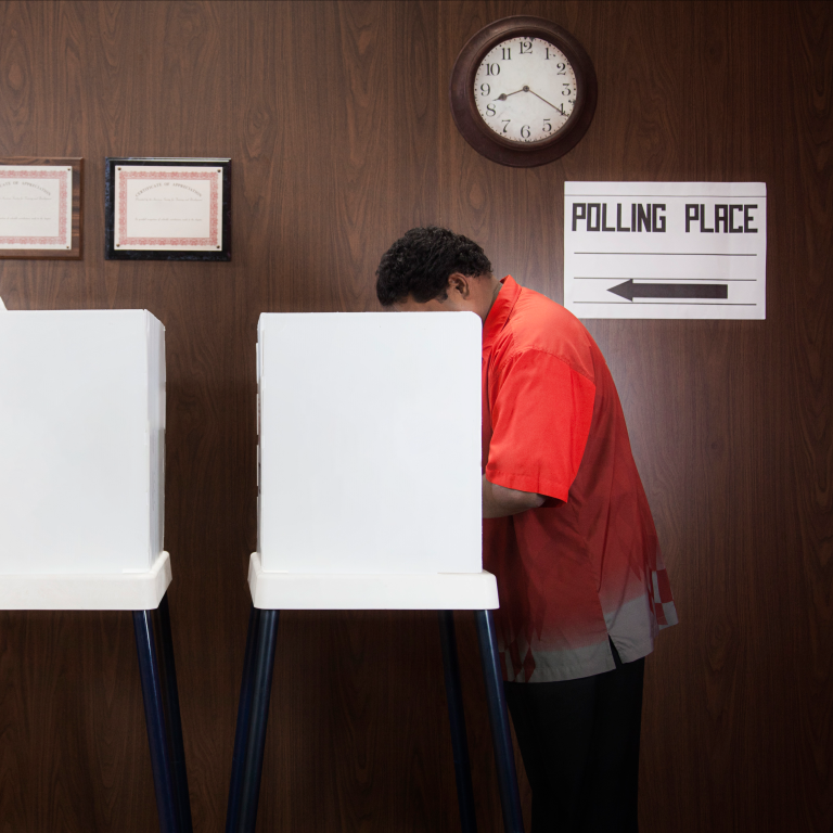 Photo of Man and Woman at Polling Booths