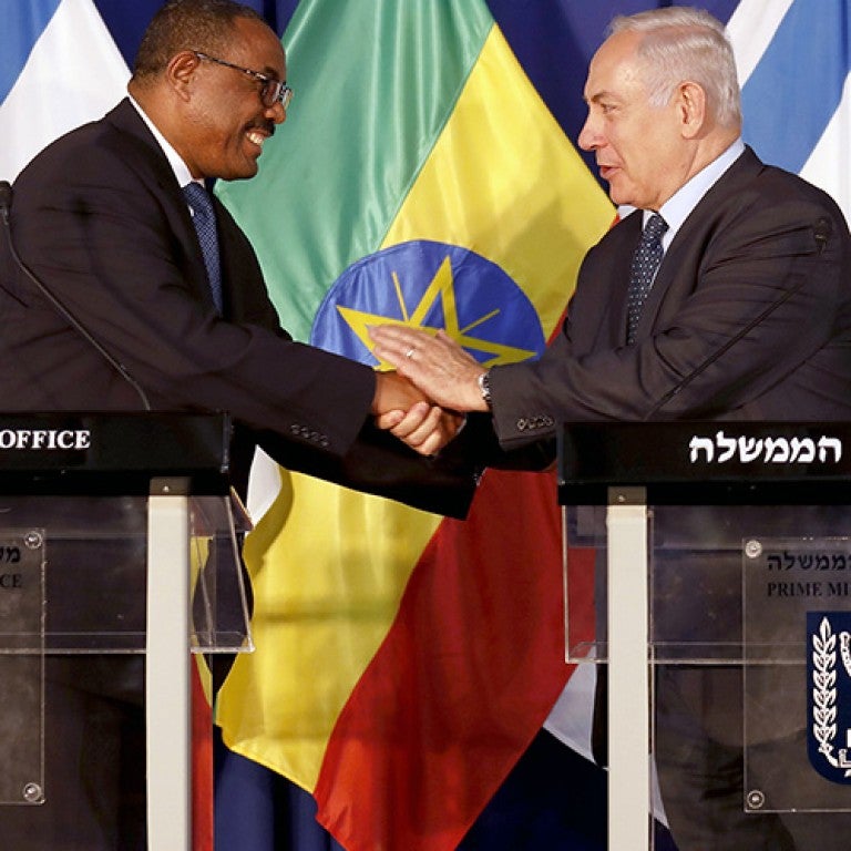 Photo of Israeli and Ethiopian Prime Minister shaking hands